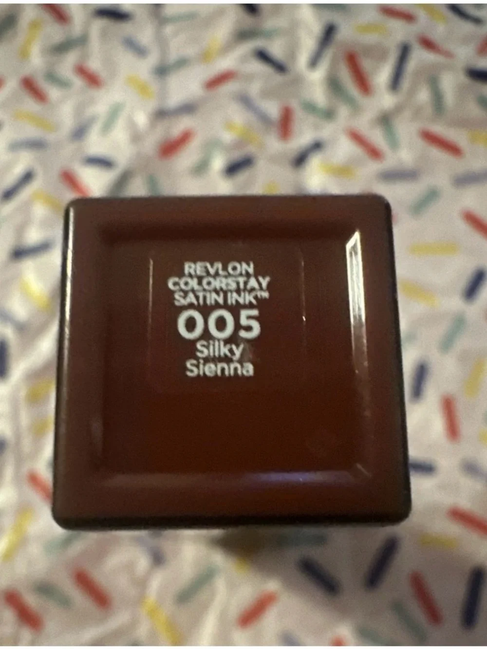 Revlon Satin Ink Liquid Lipstick 005 Silky Sienna - Deep Brown